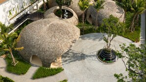 A modern architectural complex with spherical structures and a central circular plaza. - Holiday Inn Resort Samui Bophut Beach by IHG (Koh Samui)
