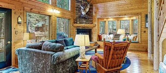Riverfront home with deck, fireplace, & salt water hot tub- near hiking & lake