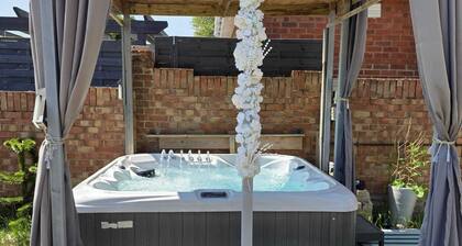 1 Bedroom couples get away with a hot tub and two-car parking.