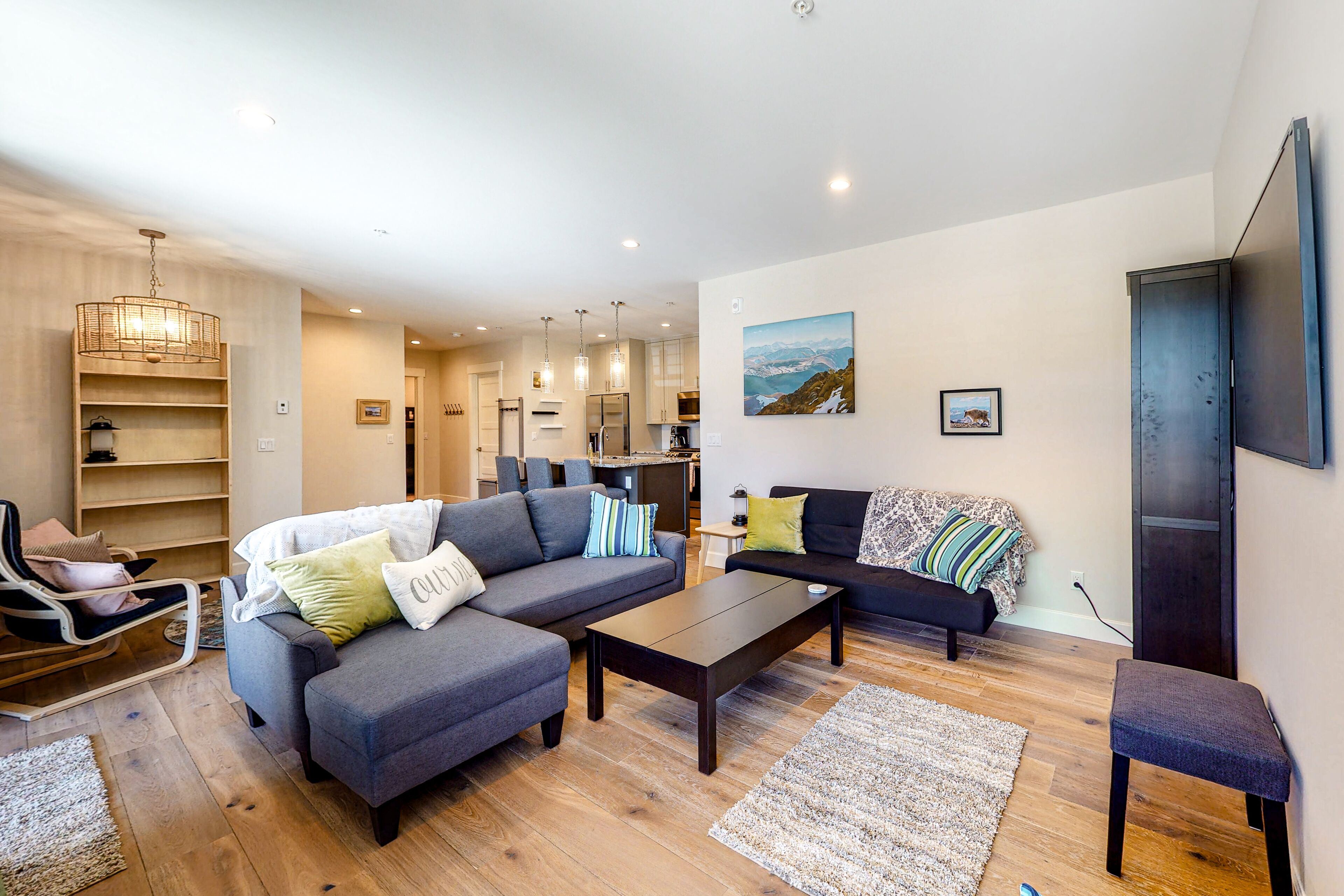 Downtown condo with mountain-view patio and garage parking - near lake & trails