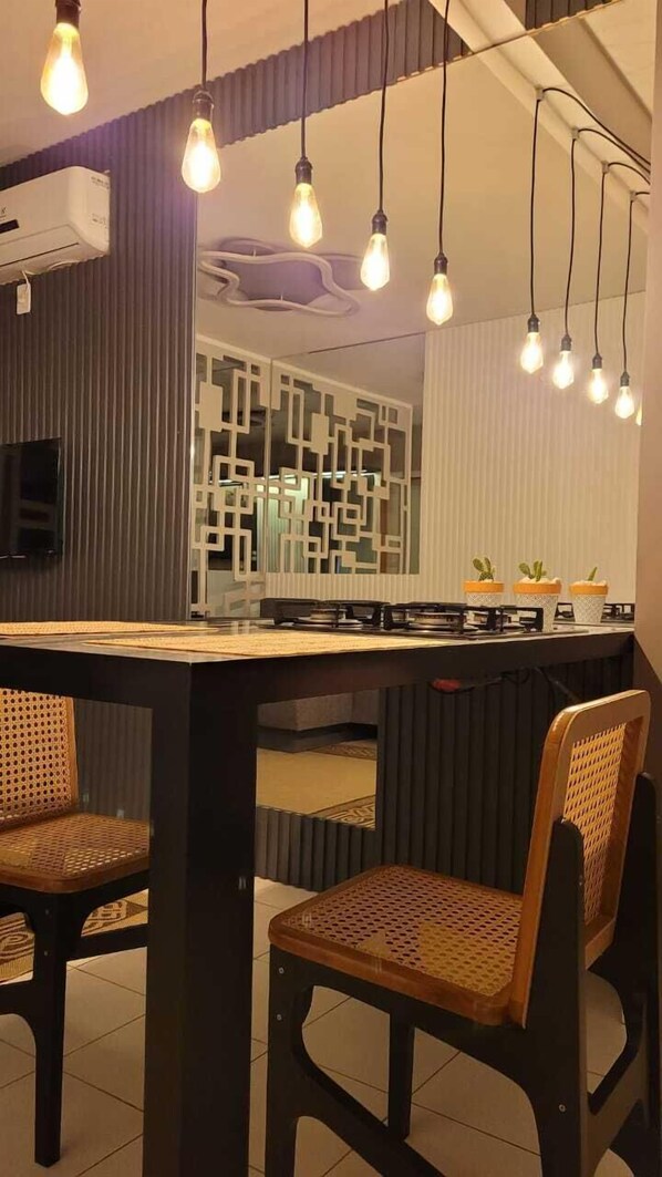 Design-Apartment | Wohnbereich | Fernseher