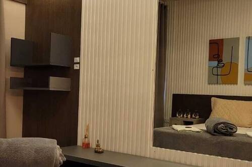 Apartamento design | Wi-Fi de cortesia, roupa de cama