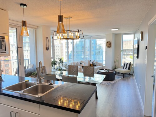 Recently Renovated 10m Walk BC PLACE  2.5bdrm Condo w Parking, Pool, Sauna + A/C