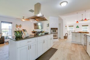 Fridge, microwave, stovetop, dishwasher - Airy Canal-Front Oasis in Cape Coral w/ Pool! (Cape Coral)