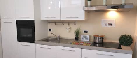 Fridge, microwave, coffee/tea maker, toaster