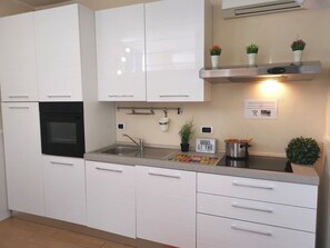 Fridge, microwave, coffee/tea maker, toaster