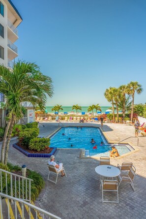 A heated pool - Beach Palms 204 – Gulf-Front Balcony, Heated Pool, Updated Kitchen & Direct Beach Access (Indian Shores)