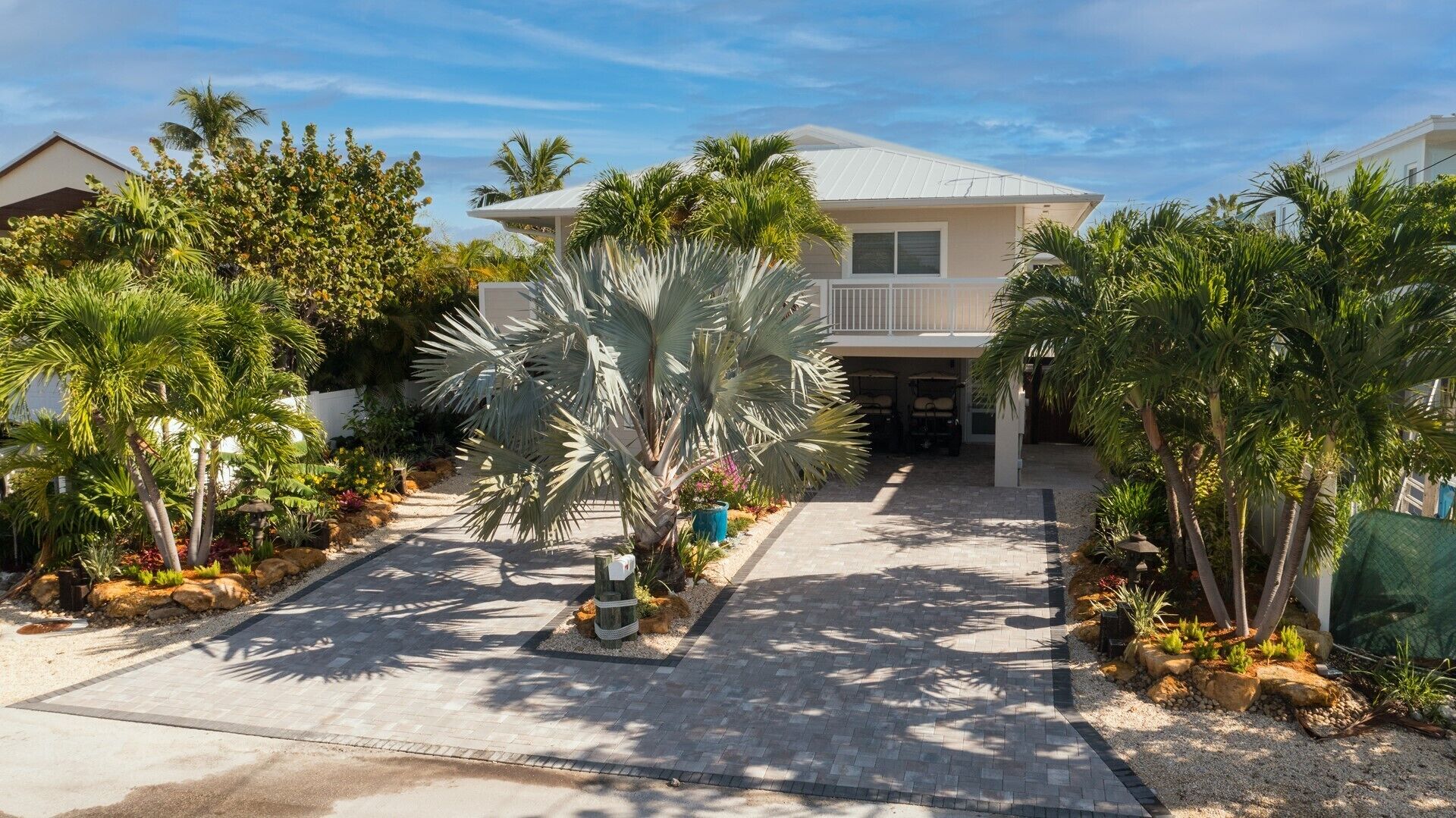 ULTIMATE outdoor living area at this 4/4 canal home with pool!