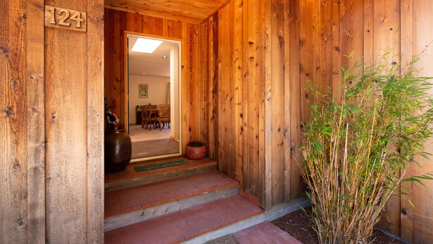 A wooden entrance with steps leading to a door marked with the number 124. - ☀️🌲Falcons Perch: Nature Lover's Dream, in coastal hills above Blue Lake🪶 (Mckinleyville)