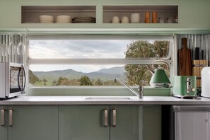 Microwave, coffee/tea maker, toaster, cookware/dishes/utensils