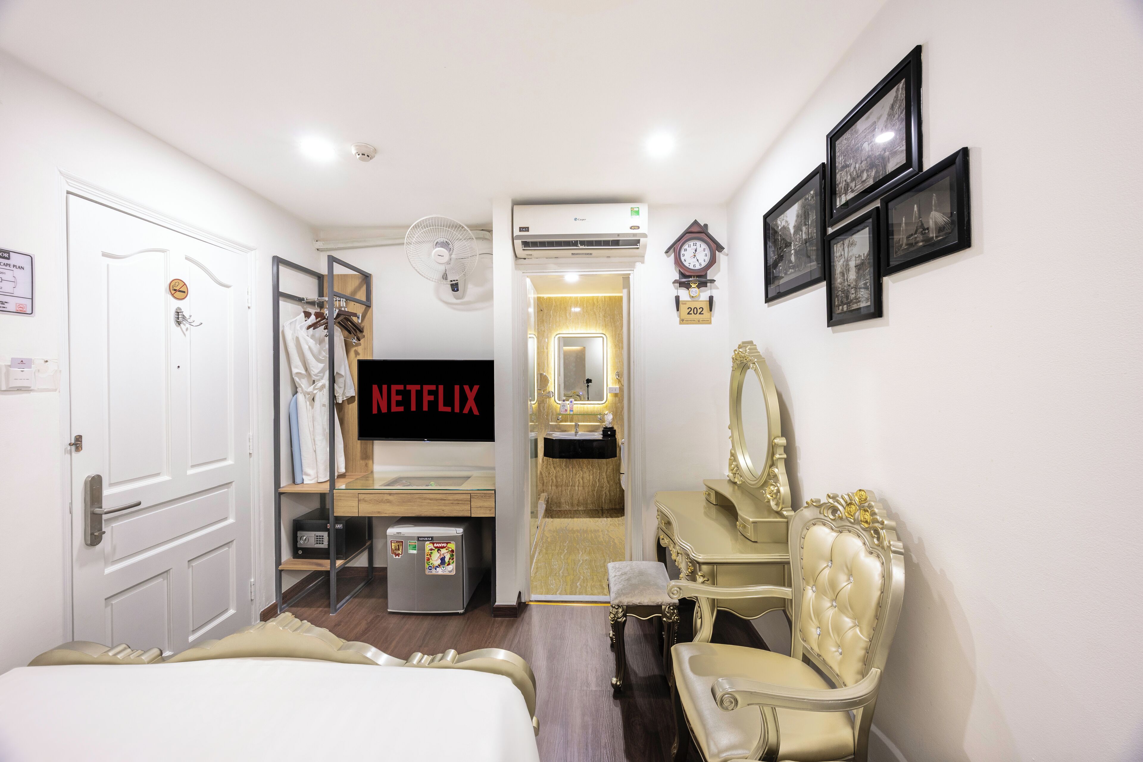 Standard Double Room | Minibar, in-room safe, blackout drapes, iron/ironing board