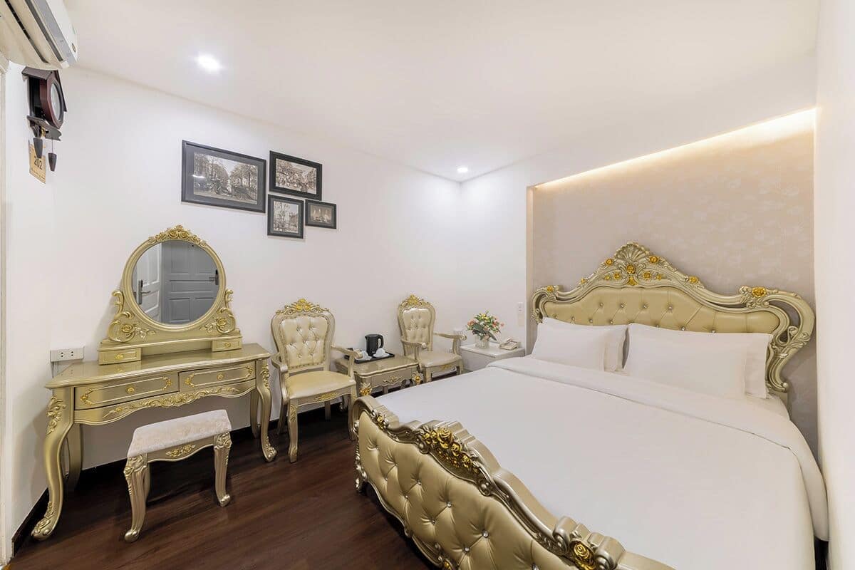 Standard Double Room | Minibar, in-room safe, blackout drapes, iron/ironing board