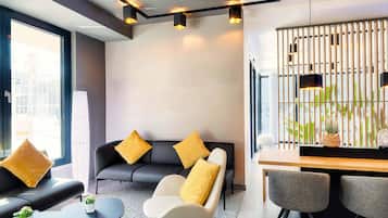 32-inch flat-screen TV with cable channels, TV, pay movies