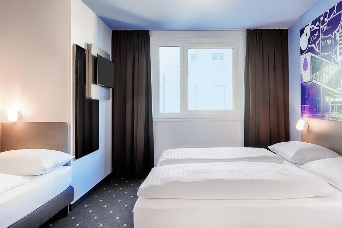 Habitación triple | Insonorización, wifi gratis y ropa de cama 