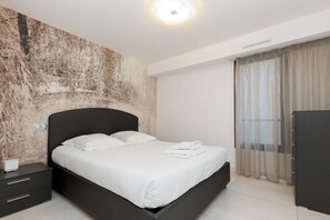 1 chambre, fer et planche à repasser, accès au Wi-Fi (inclus)