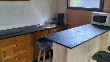 Fridge, microwave, stovetop, coffee/tea maker