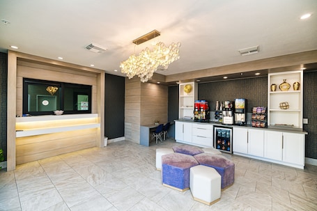 Lobby sitting area. Palace Inn IAH Houston Bush Intercontinental Airport