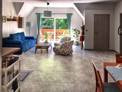 Beautifully designed 80 sqm spacious oasis in the forest, family friendly