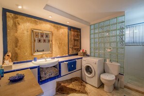 Bathtub, hair dryer, towels