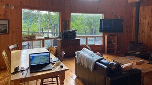 Comfort Cottage, 3 Bedrooms, Sauna, Lake View | Living area - Watabeag Lake Lucky Bay (Unorganized West Timiskaming)