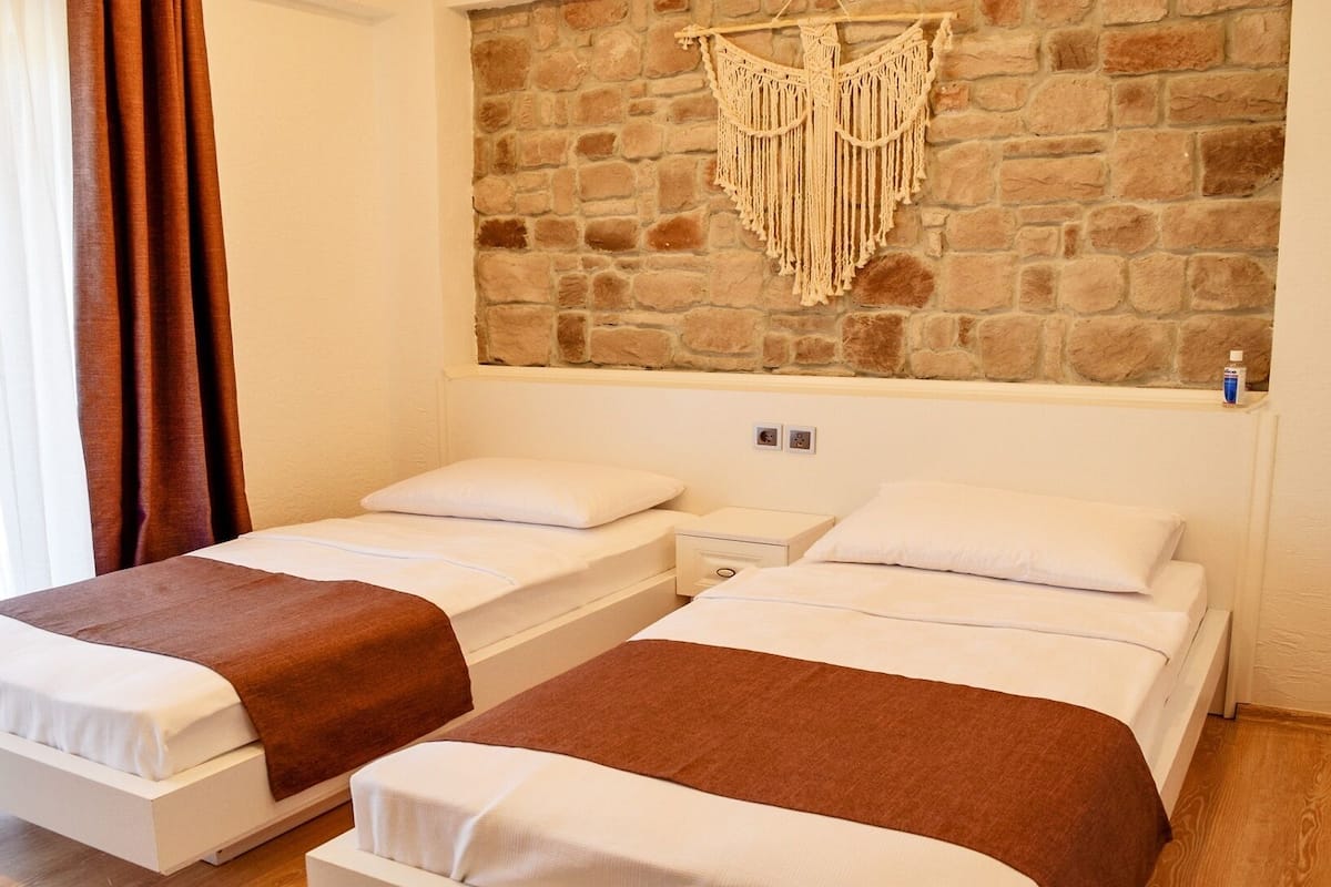 Standard Twin Room, Multiple Beds, Courtyard View | Premium bedding, minibar, free WiFi, bed sheets