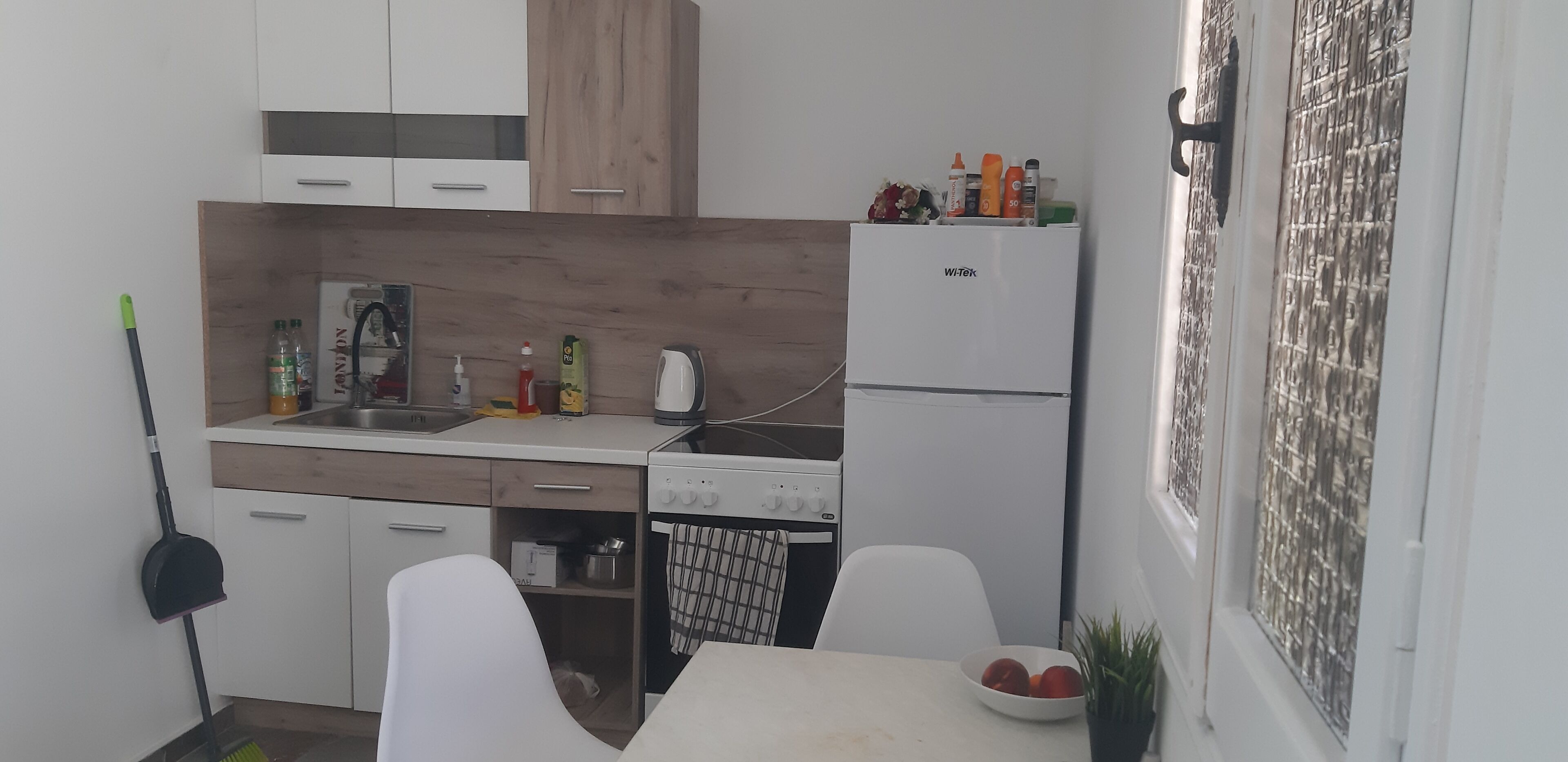 Appartamento Design, 2 camere da letto, vista giardino | Cucina privata | Frigorifero, piano cottura, tostapane, seggiolone