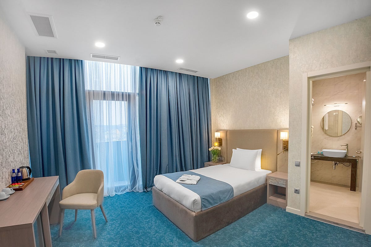 Singola Standard | Biancheria da letto di alta qualità, minibar, una cassaforte in camera