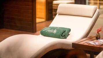 Relax in style with a comfortable reclining chair and a reading nook.