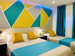 Habitación triple | Escritorio, wifi gratis, ropa de cama