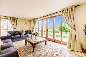 TV, fireplace - Dog friendly holiday cottage in the Cotswolds with a hot tub - Owls Roost (Cold Aston, near Bourton-on-the-Water)