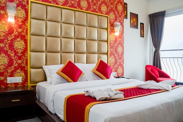 Egyptian cotton sheets, premium bedding, down duvets, memory-foam beds