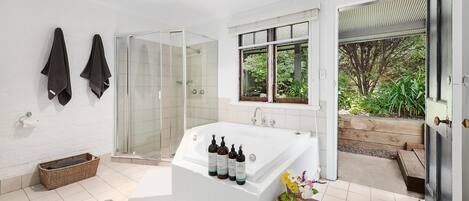 Shower, hair dryer, towels, shampoo