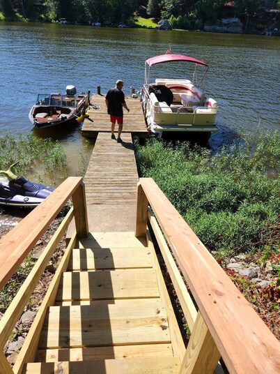 Lake shore home right on the water with private boat dock