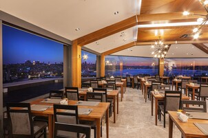 Breakfast, lunch, dinner served; Turkish cuisine, ocean views 
