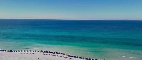 On the beach, sun-loungers