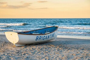 On the beach, sun loungers, beach towels