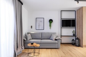 Suíte superior | Área de estar | TV 32 polegadas com canais via satélite