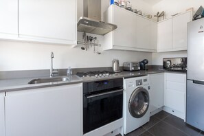 Family Apartment (2 Bedrooms) | Private kitchen | Fridge, microwave, stovetop, dishwasher