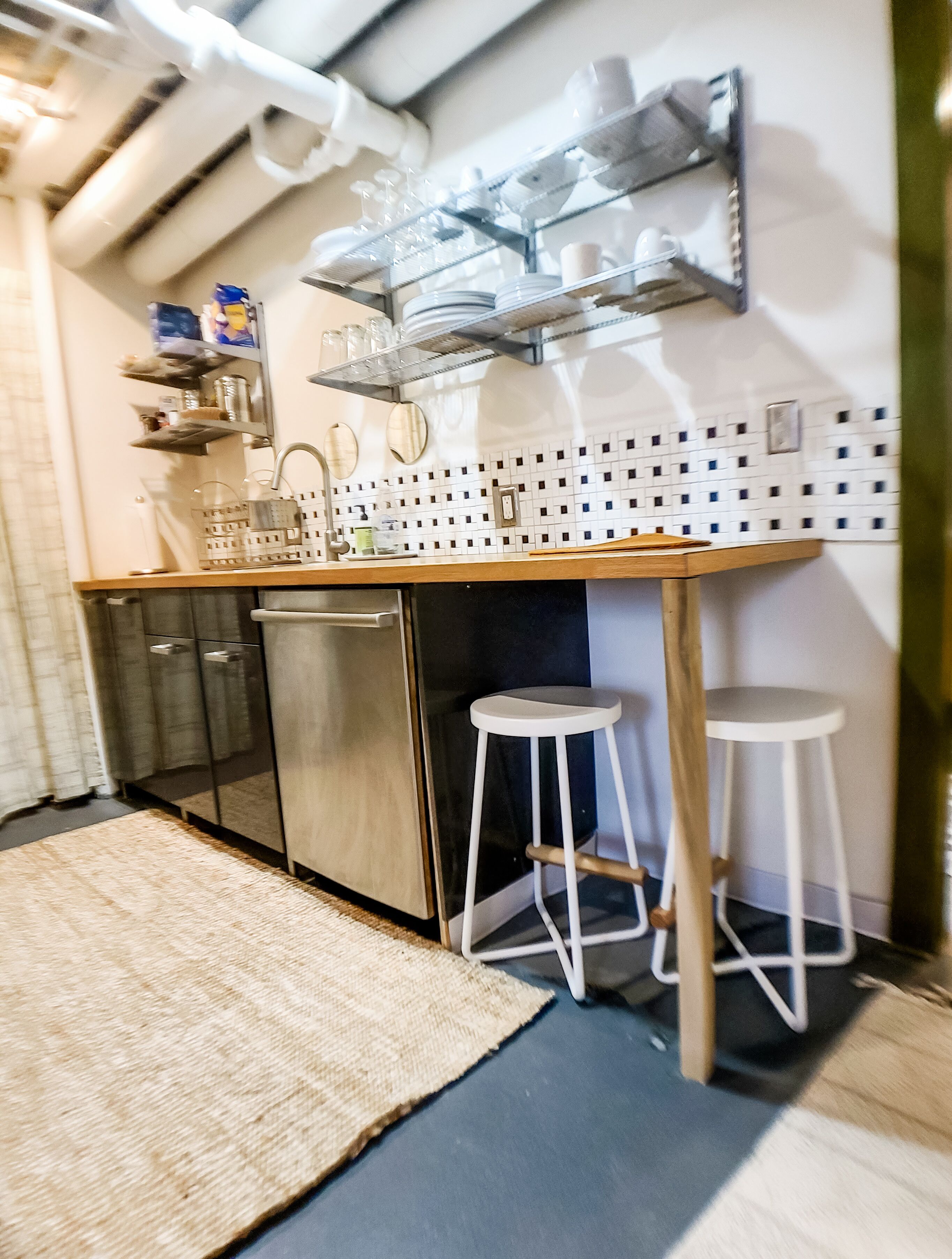 Seating area in kitchen. Dining and cooking ware provided. Dishwasher available.