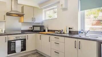 Apartment | Private kitchen | Fridge, microwave, oven, stovetop