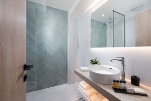 Shower, hydromassage showerhead, designer toiletries, hair dryer