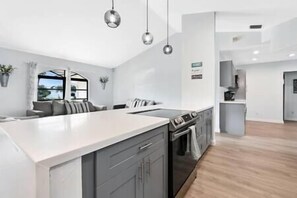Fridge, microwave, oven, stovetop - Island Retreat -Waterfront pool home! Pet Friendly! (Marco Island)