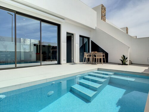 Villa with private roof terrace, patio with pool