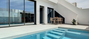 Villa with private roof terrace, patio with pool