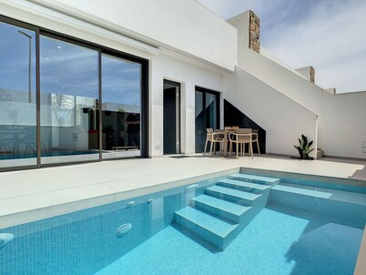 Villa with private roof terrace, patio with pool