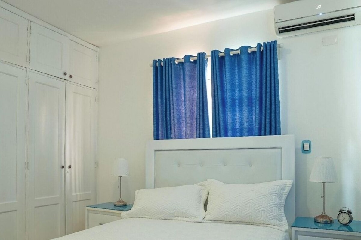 Premium bedding, down comforters, pillowtop beds, in-room safe