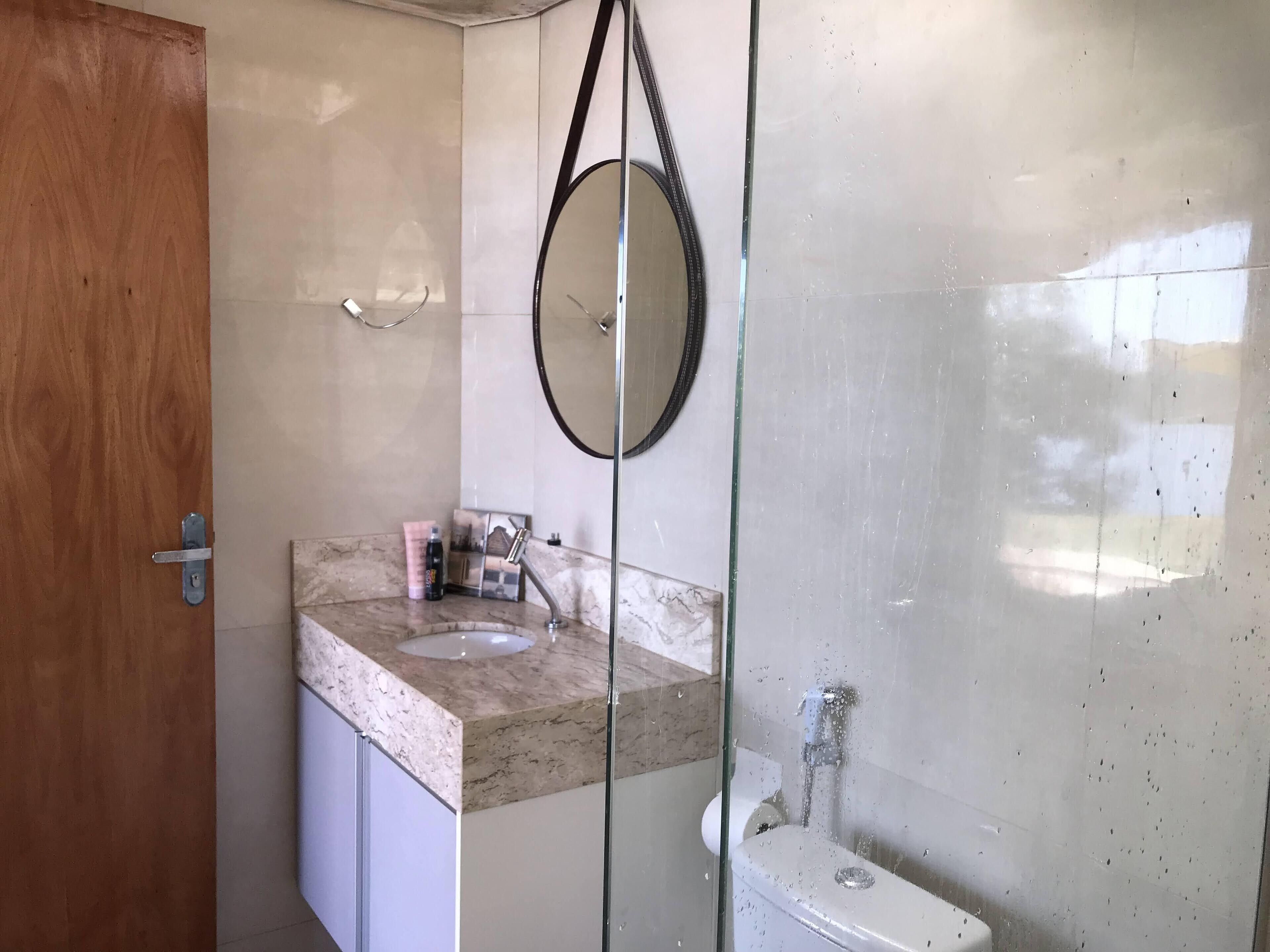 Shower, hair dryer, soap, toilet paper