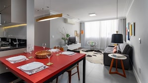 A modern apartment with a dining area, kitchen, and living space. - Modern in Ipanema Great for Families Re406 Z2 (Rio de Janeiro)