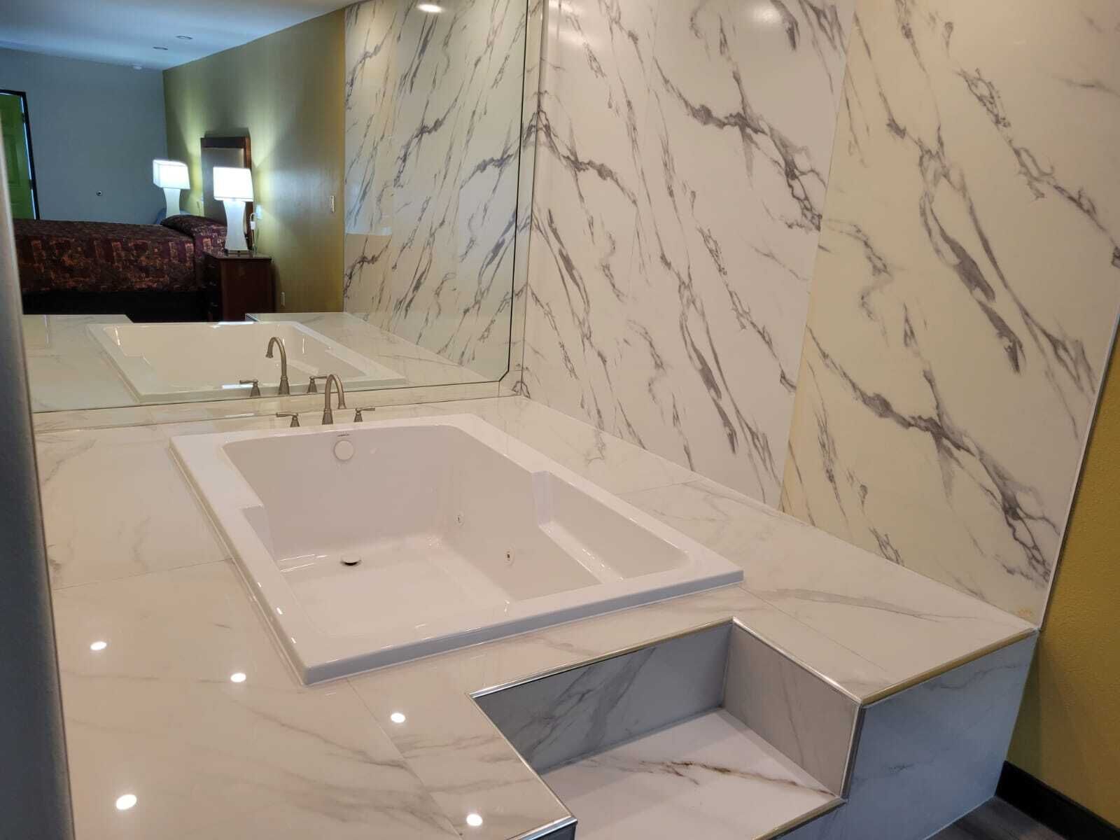 Foto - Stadium Inn & Spas