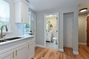 Combined shower/tub, towels, soap, toilet paper